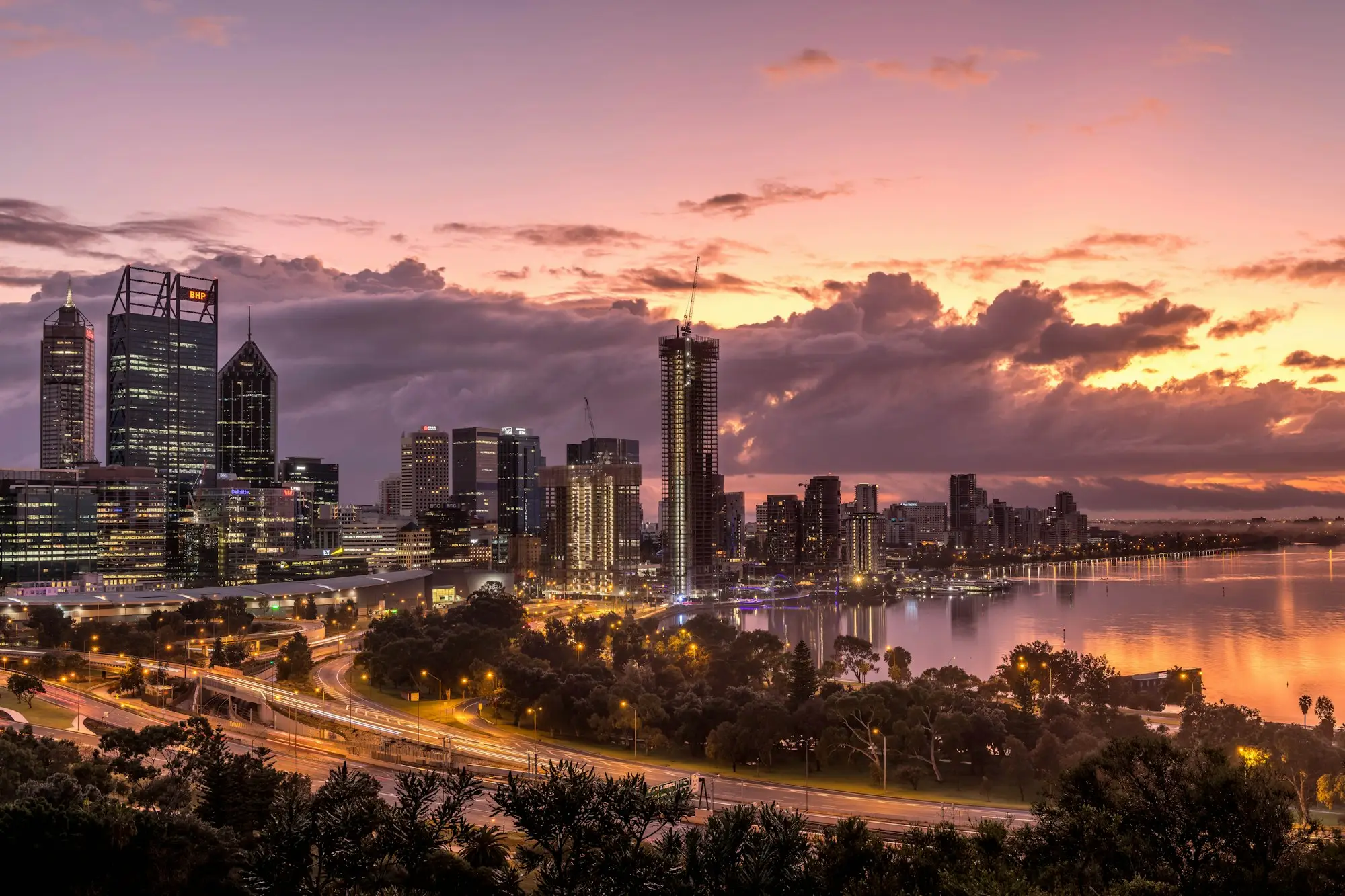 Perth city skyline and Swan River at sunrise from Kings Park